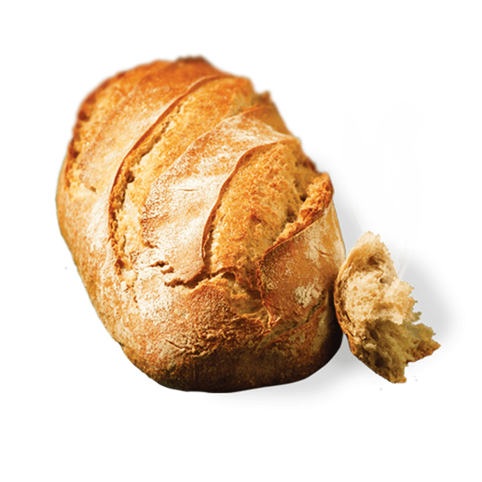 Pain artisanal rond avec croûte dorée et tranches de pain frais détachées